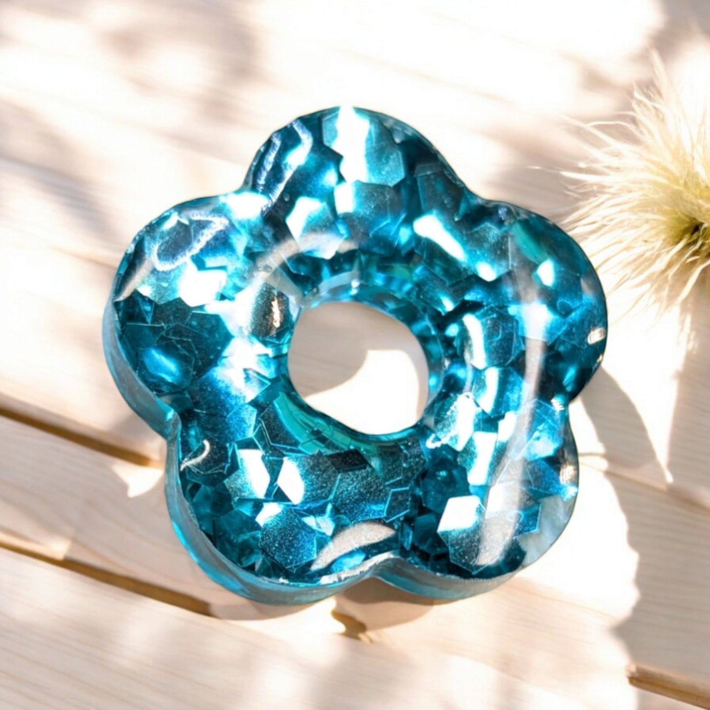 INFINITY en résine transparente et maxi paillettes bleue